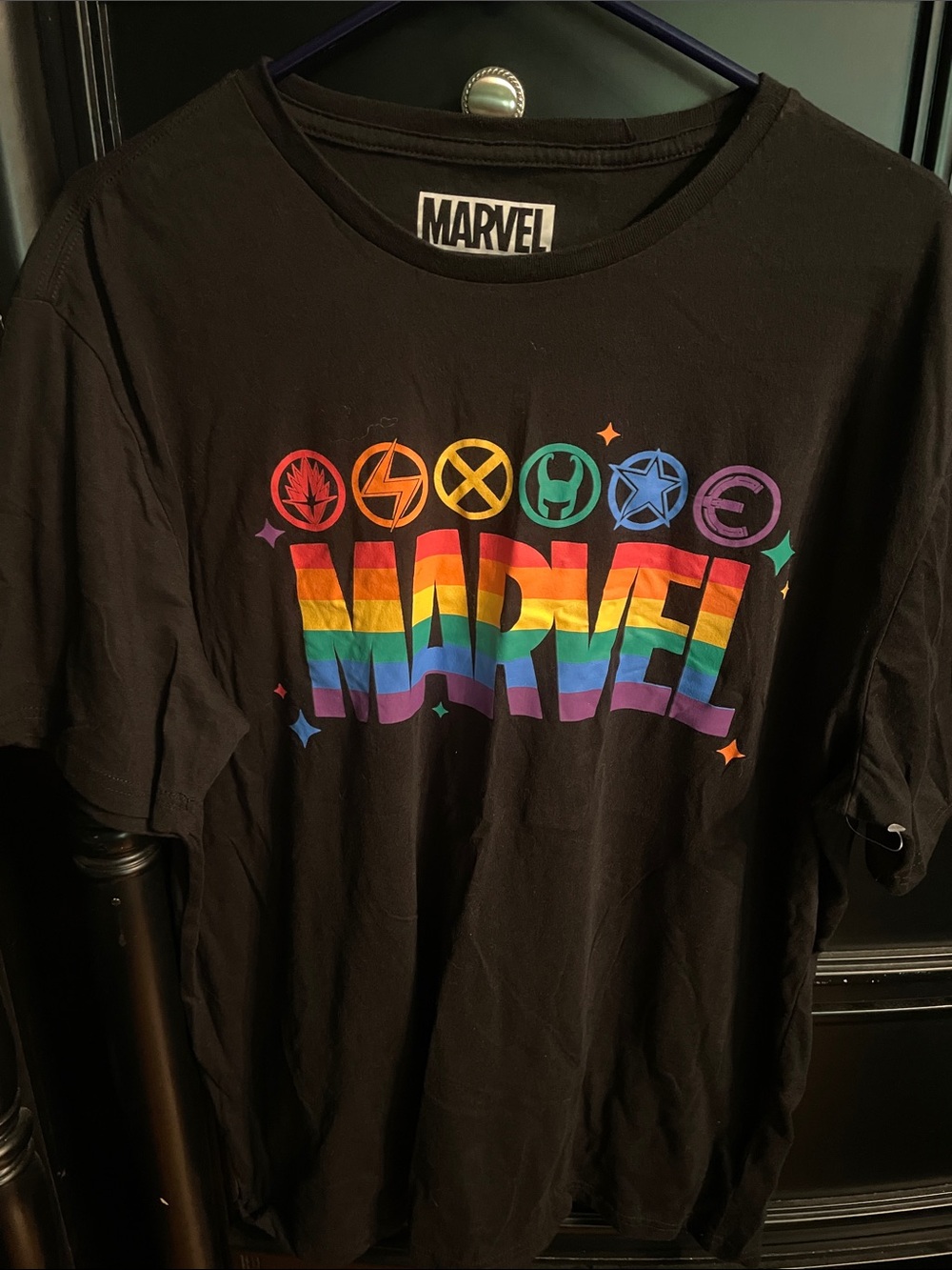 Black Marvel Tee With Rainbow Logo and Multicolored Superhero Symbols